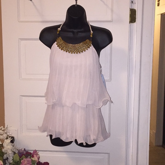 Pretty and pleated - Picture 1 of 4